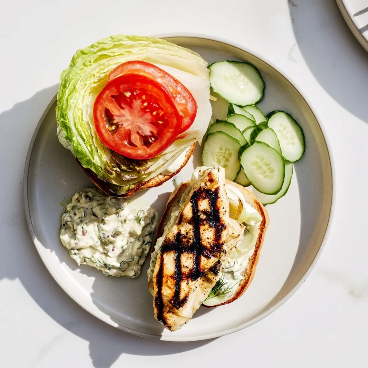 Savory grilled lemon jalapeño tartare adds a bright, spicy kick to this Aussie-inspired fish burger.