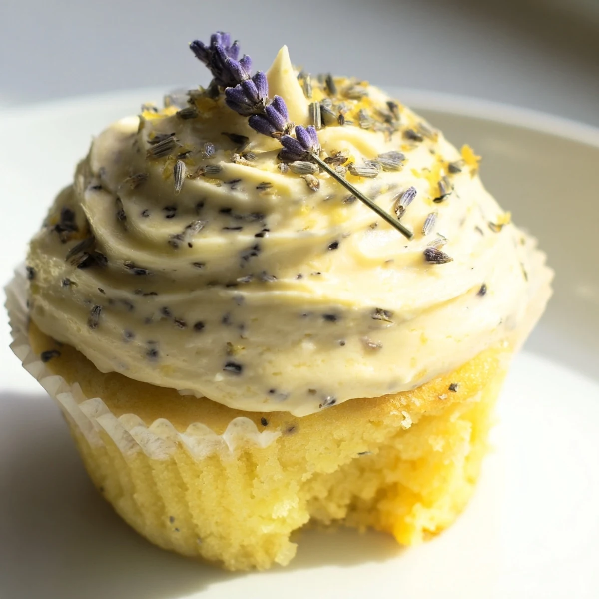 Golden spring cupcakes infused with citrus and floral lavender under creamy frosting