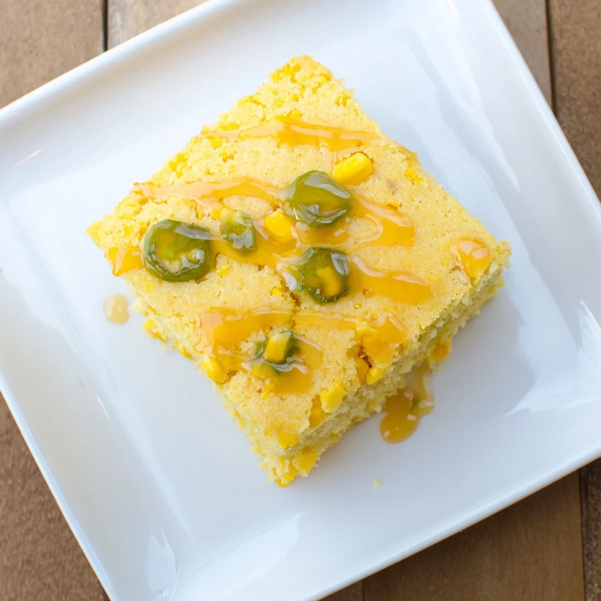 Moist cornbread with chopped jalapeños and sweet corn brushed with lime honey glaze