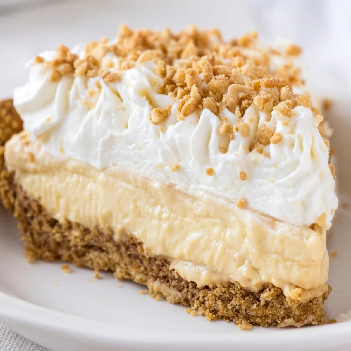 Old fashioned Amish peanut butter dream pie slice showing velvety custard filling