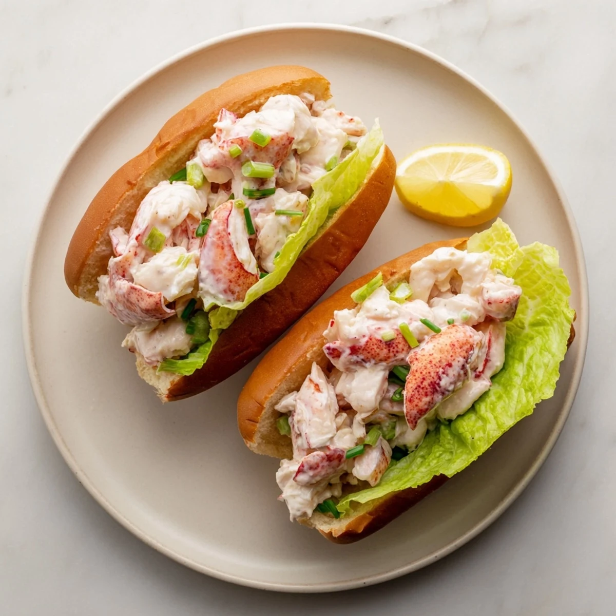 Golden toasted split-top bun overflowing with sweet Maine lobster meat dressed lightly in creamy mayonnaise